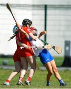 21 April 2024; Molly Kearney of Waterford is fouled by Cork goalkeeper Emma O'Sullivan resulting in a penalty being awarded during the Electric Ireland All-Ireland Camogie Minor A semi-final match between Cork and Waterford at Kilcommon in Tipperary. Photo by Tom Beary/Sportsfile