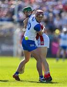 21 April 2024; Calum Lyons of Waterford in action against Seamus Harnedy of Cork during the Munster GAA Hurling Senior Championship Round 1 match between Waterford and Cork at Walsh Park in Waterford. Photo by Brendan Moran/Sportsfile