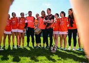 21 April 2024; Armagh manager Paul Monahan speaks to his players after his side's victory in the Electric Ireland All-Ireland Camogie Minor B semi-final match between Armagh and Carlow at Dunganny in Meath. Photo by Sam Barnes/Sportsfile