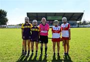 21 April 2024; Referee Philip McDonald with Wexford co-captains, Leagh Maddock, left, and Karen Hayden and Derry co-captains, Grace Kelly, left, and Conla Kerr, ahead of the Electric Ireland All-Ireland Camogie Minor A Shield semi-final match between Derry and Wexford at Clane in Kildare. Photo by Daire Brennan/Sportsfile