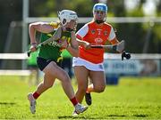 21 April 2024; Sarah Sheehan of Carlow in action against Caoimhe Farrell of Armagh during the Electric Ireland All-Ireland Camogie Minor B semi-final match between Armagh and Carlow at Dunganny in Meath. Photo by Sam Barnes/Sportsfile