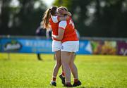 21 April 2024; Naoise Hughes, right, and Erin Murphy of Armagh celebrate after their side's victory in the Electric Ireland All-Ireland Camogie Minor B semi-final match between Armagh and Carlow at Dunganny in Meath. Photo by Sam Barnes/Sportsfile
