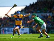 21 April 2024; Shane O'Donnell of Clare is tackled by Sean Finn of Limerick during the Munster GAA Hurling Senior Championship Round 1 match between Clare and Limerick at Cusack Park in Ennis, Clare. Photo by Ray McManus/Sportsfile