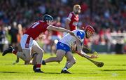 21 April 2024; Tadhg de Burca of Waterford in action against Conor Lehane of Cork during the Munster GAA Hurling Senior Championship Round 1 match between Waterford and Cork at Walsh Park in Waterford. Photo by Brendan Moran/Sportsfile
