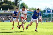21 April 2024; Darren McCurry of Tyrone in action against Cian Reilly of Cavan vduring the Ulster GAA Football Senior Championship quarter-final match between Cavan and Tyrone at Kingspan Breffni in Cavan. Photo by Seb Daly/Sportsfile