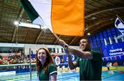 21 April 2024; Ireland flagbearers Deaten Registe and Ellen Keane during the opening ceremony on day one of the Para Swimming European Championships at the Penteada Olympic Pools Complex in Funchal, Portugal. Photo by Ramsey Cardy/Sportsfile