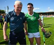 21 April 2024; Sean Finn of Limerick and John Keily after the Munster GAA Hurling Senior Championship Round 1 match between Clare and Limerick at Cusack Park in Ennis, Clare. Photo by Ray McManus/Sportsfile