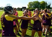 21 April 2024; Layla Stafford, left, and Leagh Maddock of Wexford celebrate after the Electric Ireland All-Ireland Camogie Minor A Shield semi-final match between Derry and Wexford at Clane in Kildare. Photo by Daire Brennan/Sportsfile