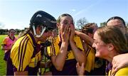 21 April 2024; Leagh Maddock of Wexford celebrates with team-mates after the Electric Ireland All-Ireland Camogie Minor A Shield semi-final match between Derry and Wexford at Clane in Kildare. Photo by Daire Brennan/Sportsfile