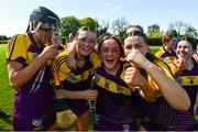 21 April 2024; Wexford players, left to right, Layla Stafford, Leagh Maddock, Karen Hayden, and Jane Murphy, celebrate after the Electric Ireland All-Ireland Camogie Minor A Shield semi-final match between Derry and Wexford at Clane in Kildare. Photo by Daire Brennan/Sportsfile