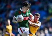 21 April 2024; Conor Loftus of Mayo in action against Patrick Gavin of Roscommon during the Connacht GAA Football Senior Championship semi-final match between Roscommon and Mayo at Dr Hyde Park in Roscommon. Photo by Piaras Ó Mídheach/Sportsfile
