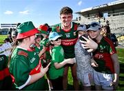 21 April 2024; Jordan Flynn of Mayo celebrates with supporters after victory in the Connacht GAA Football Senior Championship semi-final match between Roscommon and Mayo at Dr Hyde Park in Roscommon. Photo by Piaras Ó Mídheach/Sportsfile