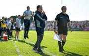 21 April 2024; Waterford manager Davy Fitzgerald and selector Peter Queally, left, and line umpire Liam Gordon watch the final moments of the Munster GAA Hurling Senior Championship Round 1 match between Waterford and Cork at Walsh Park in Waterford. Photo by Brendan Moran/Sportsfile