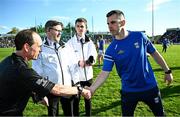 21 April 2024; Cavan manager Raymond Galligan shakes hands with referee David Coldrick after the Ulster GAA Football Senior Championship quarter-final match between Cavan and Tyrone at Kingspan Breffni in Cavan. Photo by Seb Daly/Sportsfile