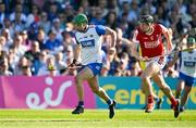 21 April 2024; Michael Kiely of Waterford in action against Robert Downey of Cork during the Munster GAA Hurling Senior Championship Round 1 match between Waterford and Cork at Walsh Park in Waterford. Photo by Brendan Moran/Sportsfile