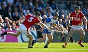 21 April 2024; Kevin Mahony of Waterford in action against Damien Cahalane and Robert Downey of Cork during the Munster GAA Hurling Senior Championship Round 1 match between Waterford and Cork at Walsh Park in Waterford. Photo by Brendan Moran/Sportsfile