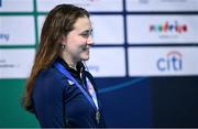 21 April 2024; Róisín Ní Ríain of Ireland with her silver medal after finishing second in the Women's 100m Butterfly S13 final during day one of the Para Swimming European Championships at the Penteada Olympic Pools Complex in Funchal, Portugal. Photo by Ramsey Cardy/Sportsfile