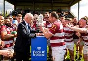 21 April 2024; Leinster Rugby president Billy Murphy presents the Towns Cup to Tullow RFC captain Scott Calbeck after the Bank of Ireland Provincial Towns Cup final match between Ashbourne RFC and Tullow RFC at Carlow RFC in Carlow. Photo by Matt Browne/Sportsfile