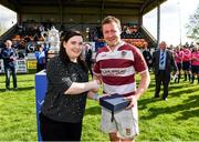 21 April 2024; Edel Maher from Bank of Ireland presents the player of the match trophy to Cillian Murphy of Tullow RFC during the Bank of Ireland Provincial Towns Cup final match between Ashbourne RFC and Tullow RFC at Carlow RFC in Carlow. Photo by Matt Browne/Sportsfile