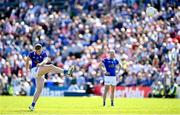 21 April 2024; Paddy Lynch of Cavan attempts to kick a free during the Ulster GAA Football Senior Championship quarter-final match between Cavan and Tyrone at Kingspan Breffni in Cavan. Photo by Seb Daly/Sportsfile