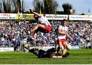 21 April 2024; Cavan goalkeeper Gary O’Rourke saves a shot from Tyrone's Darren McCurry during the Ulster GAA Football Senior Championship quarter-final match between Cavan and Tyrone at Kingspan Breffni in Cavan. Photo by Seb Daly/Sportsfile