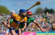 21 April 2024; Shane O'Donnell of Clare is tackled by Barry Nash of Limerick during the Munster GAA Hurling Senior Championship Round 1 match between Clare and Limerick at Cusack Park in Ennis, Clare. Photo by Ray McManus/Sportsfile