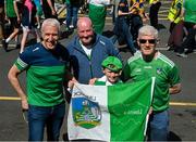 21 April 2024; Nine year old Will Sharpe, from Fethard, in Tipperary, with John Cummins, Tim and Jack Keating, before the Munster GAA Hurling Senior Championship Round 1 match between Clare and Limerick at Cusack Park in Ennis, Clare. Photo by Ray McManus/Sportsfile