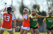 21 April 2024; Molly Short of Armagh in action against Niamh Tracey of Carlow during the Electric Ireland All-Ireland Camogie Minor B semi-final match between Armagh and Carlow at Dunganny in Meath. Photo by Sam Barnes/Sportsfile