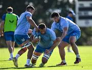 22 April 2024; Jason Jenkins, centre, with Scott Penny and Thomas Clarkson during a Leinster Rugby squad training session at Fourways High School in Johannesburg, South Africa. Photo by Harry Murphy/Sportsfile