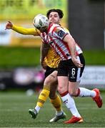 22 April 2024; Ruairí Keating of St Patrick's Athletic in action against Mark Connolly of Derry City during the SSE Airtricity Men's Premier Division match between Derry City and St Patrick's Athletic at The Ryan McBride Brandywell Stadium in Derry. Photo by Piaras Ó Mídheach/Sportsfile