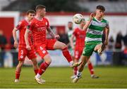 22 April 2024; Kameron Ledwidge of Shelbourne in action against Johnny Kenny of Shamrock Rovers during the SSE Airtricity Men's Premier Division match between Shelbourne and Shamrock Rovers at Tolka Park in Dublin. Photo by Stephen McCarthy/Sportsfile