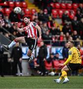 22 April 2024; Patrick Hoban of Derry City in action against Jamie Lennon of St Patrick's Athletic during the SSE Airtricity Men's Premier Division match between Derry City and St Patrick's Athletic at The Ryan McBride Brandywell Stadium in Derry. Photo by Piaras Ó Mídheach/Sportsfile