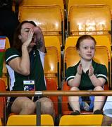 22 April 2024; Ireland swimmers Ellen Keane, left, and Dearbhaile Brady cheer on Roisin Ni Riain of Ireland during her Women's 100m Breaststroke SB13 Final during day two of the Para Swimming European Championships at the Penteada Olympic Pools Complex in Funchal, Portugal. Photo by Ramsey Cardy/Sportsfile