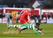 22 April 2024; Darragh Burns of Shamrock Rovers in action against Kameron Ledwidge of Shelbourne during the SSE Airtricity Men's Premier Division match between Shelbourne and Shamrock Rovers at Tolka Park in Dublin. Photo by Stephen McCarthy/Sportsfile