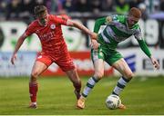 22 April 2024; Darragh Nugent of Shamrock Rovers is tackled by JJ Lunney of Shelbourne during the SSE Airtricity Men's Premier Division match between Shelbourne and Shamrock Rovers at Tolka Park in Dublin. Photo by Shauna Clinton/Sportsfile