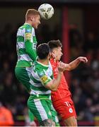 22 April 2024; Darragh Nugent of Shamrock Rovers in action against Matty Smith of Shelbourne during the SSE Airtricity Men's Premier Division match between Shelbourne and Shamrock Rovers at Tolka Park in Dublin. Photo by Shauna Clinton/Sportsfile