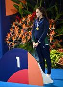 22 April 2024; Róisín Ní Ríain of Ireland on the podium with her gold medal after winning the Women's 100m Breaststroke SB13 Final during day two of the Para Swimming European Championships at the Penteada Olympic Pools Complex in Funchal, Portugal. Photo by Ramsey Cardy/Sportsfile