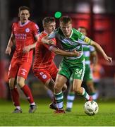 22 April 2024; Conan Noonan of Shamrock Rovers in action against JJ Lunney of Shelbourne during the SSE Airtricity Men's Premier Division match between Shelbourne and Shamrock Rovers at Tolka Park in Dublin. Photo by Shauna Clinton/Sportsfile