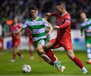 22 April 2024; Paddy Barrett of Shelbourne in action against Johnny Kenny of Shamrock Rovers during the SSE Airtricity Men's Premier Division match between Shelbourne and Shamrock Rovers at Tolka Park in Dublin. Photo by Shauna Clinton/Sportsfile