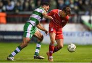 22 April 2024; Matty Smith of Shelbourne in action against Roberto Lopes of Shamrock Rovers during the SSE Airtricity Men's Premier Division match between Shelbourne and Shamrock Rovers at Tolka Park in Dublin. Photo by Shauna Clinton/Sportsfile