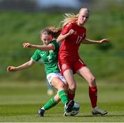 23 April 2024; Mathilde Brandt of Denmark in action against Kate Jones of Republic of Ireland during the women's under 16's international friendly match between Republic of Ireland and Denmark at the FAI National Training Centre in Abbotstown, Dublin. Photo by Stephen McCarthy/Sportsfile