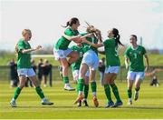 23 April 2024; Republic of Ireland players celebrate after Maeve Wollmer, centre, scored their side's first goal during the women's under 16's international friendly match between Republic of Ireland and Denmark at the FAI National Training Centre in Abbotstown, Dublin. Photo by Stephen McCarthy/Sportsfile