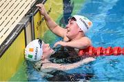 23 April 2024; Nicole Turner of Ireland, right, is congratulated by Dearbhaile Brady, after finishing third in the Women's 200m Individual Medley SM6 Final during day three of the Para Swimming European Championships at the Penteada Olympic Pools Complex in Funchal, Portugal. Photo by Ramsey Cardy/Sportsfile