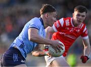 23 April 2024; Jamie McCarville of Dublin in action against Keelin Martin of Louth during the EirGrid Leinster GAA Football U20 Championship semi-final match between Dublin and Louth at Parnell Park in Dublin. Photo by Sam Barnes/Sportsfile