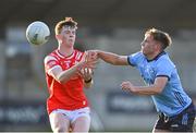 23 April 2024; Joe Quigley of Dublin in action against James Maguire of Louth during the EirGrid Leinster GAA Football U20 Championship semi-final match between Dublin and Louth at Parnell Park in Dublin. Photo by Sam Barnes/Sportsfile