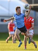23 April 2024; Mark McNally of Dublin in action against Pearse Grimes Murphy of Louth during the EirGrid Leinster GAA Football U20 Championship semi-final match between Dublin and Louth at Parnell Park in Dublin. Photo by Sam Barnes/Sportsfile