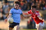 23 April 2024; Mark McNally of Dublin in action against Aaron McGlew of Louth during the EirGrid Leinster GAA Football U20 Championship semi-final match between Dublin and Louth at Parnell Park in Dublin. Photo by Sam Barnes/Sportsfile