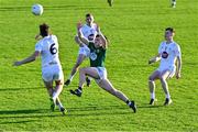 23 April 2024; Hughie Corcoran of Meath in action against Kildare players, from left, James Harris, Rob Fitzgerald and Ethan Mountaine during the EirGrid Leinster GAA Football U20 Championship semi-final match between Kildare and Meath at Manguard Park at the Kildare GAA Centre of Excellence in Hawkfield, Kildare. Photo by Tyler Miller/Sportsfile