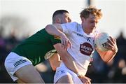 23 April 2024; Niall Dolan of Kildare in action against Liam Kelly of Meath during the EirGrid Leinster GAA Football U20 Championship semi-final match between Kildare and Meath at Manguard Park at the Kildare GAA Centre of Excellence in Hawkfield, Kildare. Photo by Tyler Miller/Sportsfile