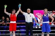 23 April 2024; Aoife O'Rourke of Ireland, left, is declared victorious over Veronika Nakota of Hungary in their Women's 75kg middleweight quarter-final bout during the 2024 European Boxing Championships at Aleksandar Nikolic Hall in Belgrade, Serbia. Photo by Nikola Krstic/Sportsfile